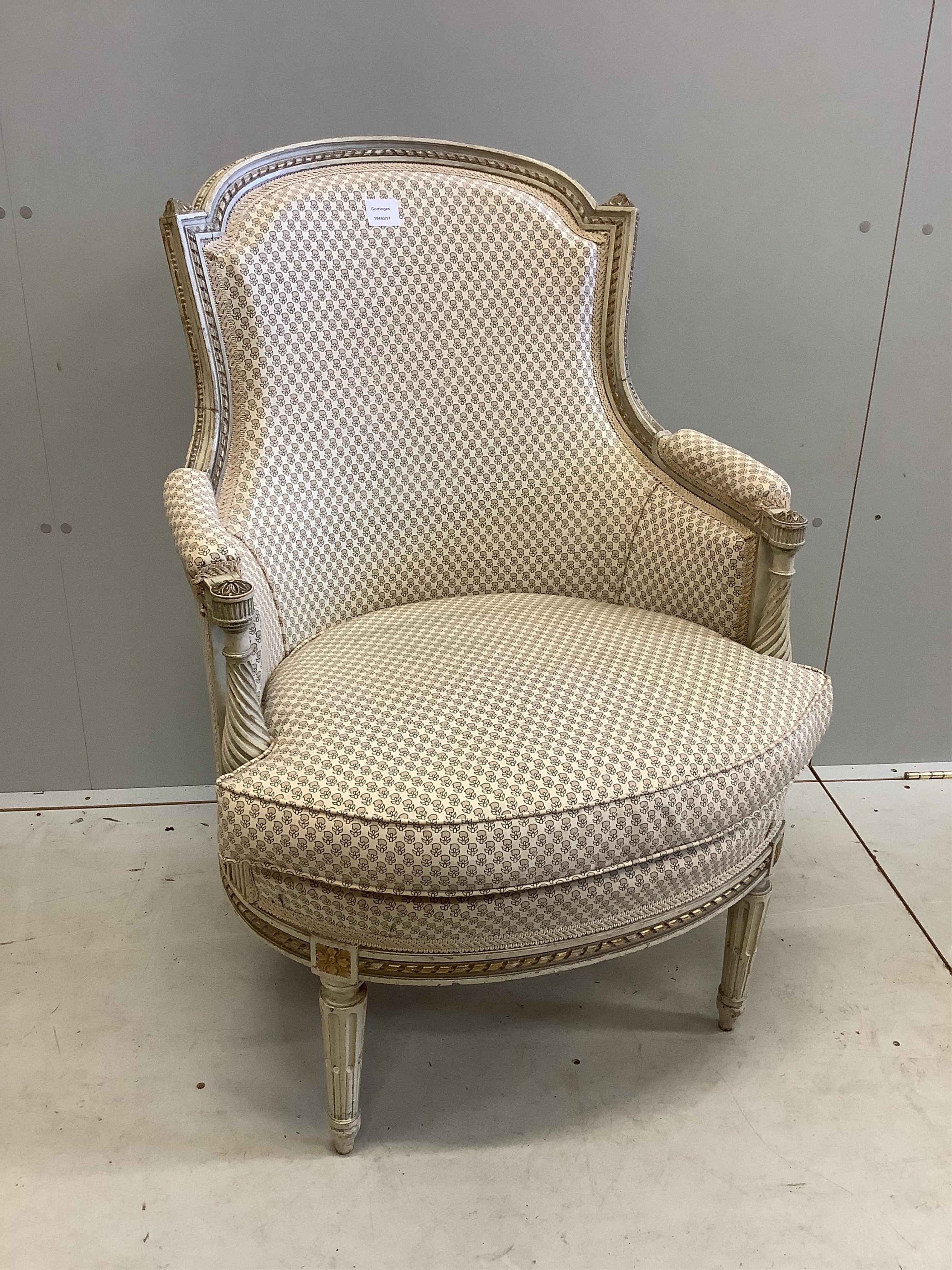 A Louis XVI style cream painted upholstered armchair, width 68cm, depth 56cm, height 99cm. Condition - good